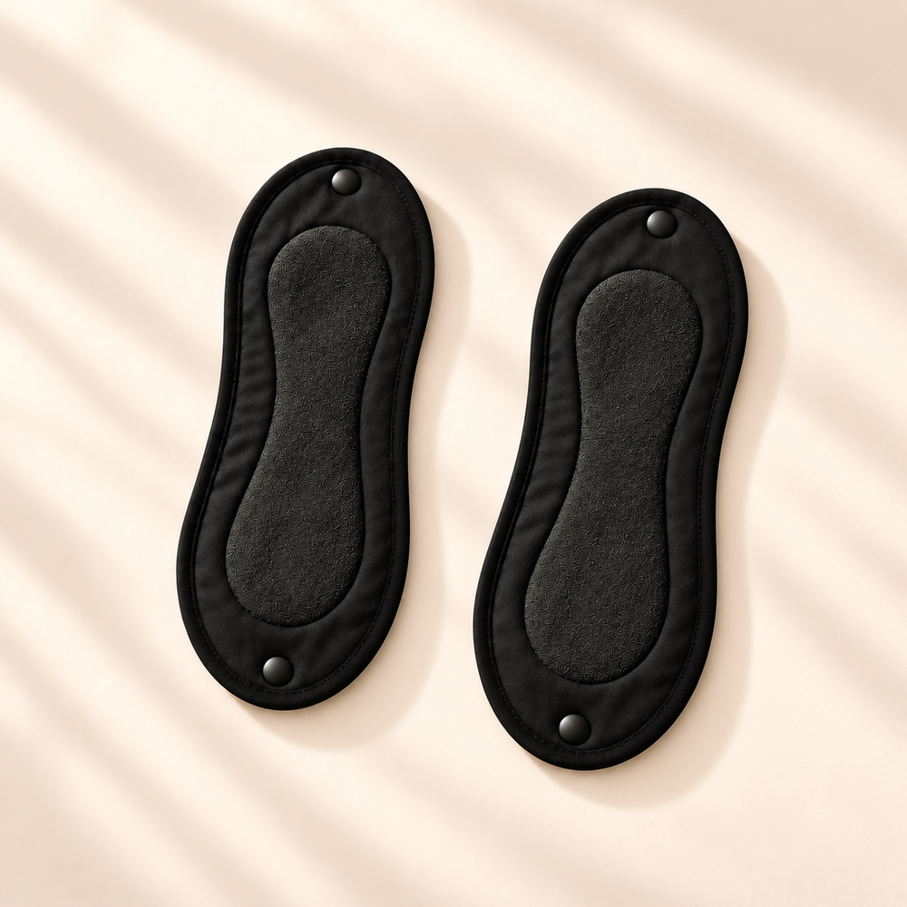 Two black Drylora removable, washable pads